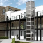 Modern apartment building with wood paneling, large windows, and a glass elevator in the courtyard; balconies run along the upper floors.