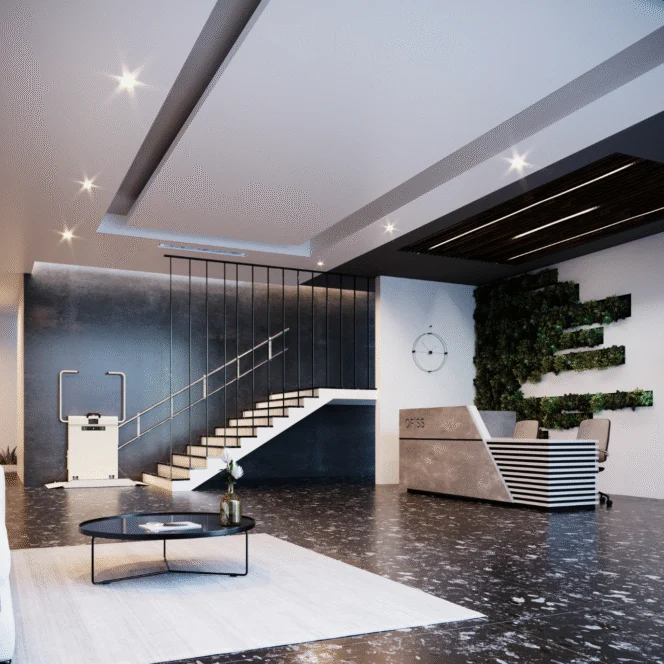 Modern office lobby with a reception desk, wall-mounted clock, vertical garden, staircase, coffee table, and a fitness machine against a gray wall.